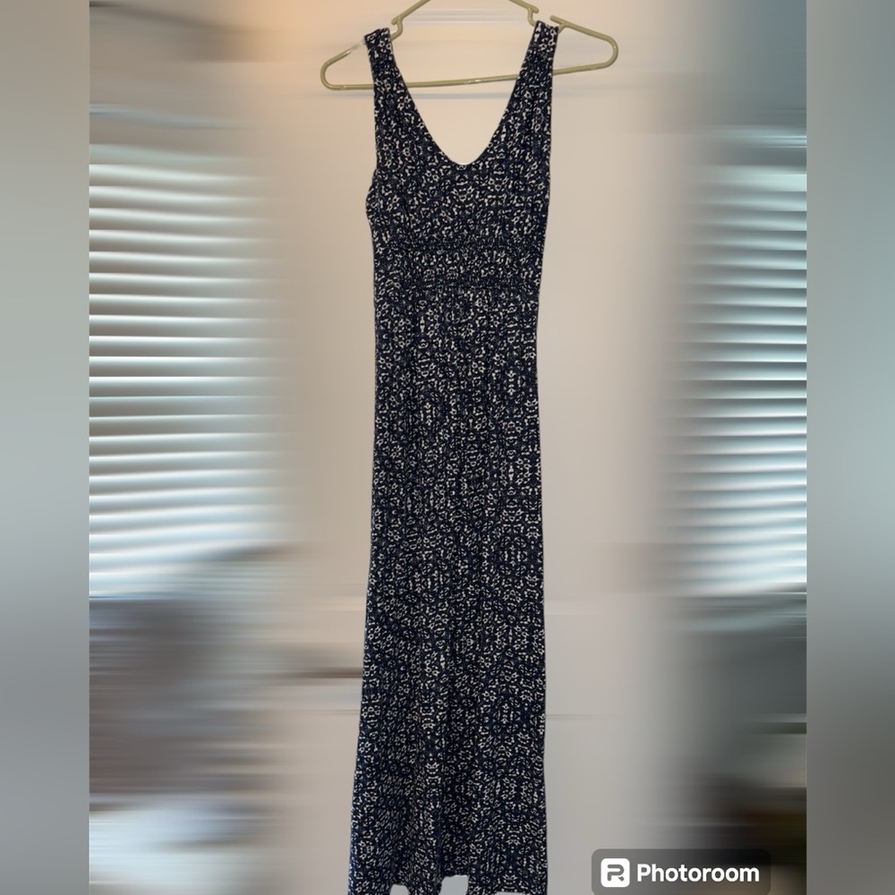 Maxi length navy and white pattern sundress with smocked elastic back